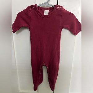 Kate Quinn Maroon infant onesie.